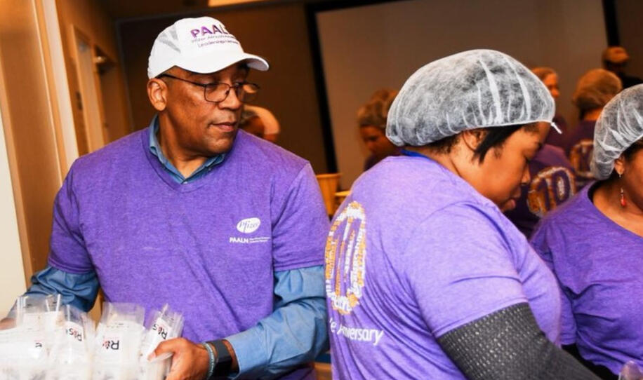 Pfizer volunteers helping out at a 10th anniversary event.